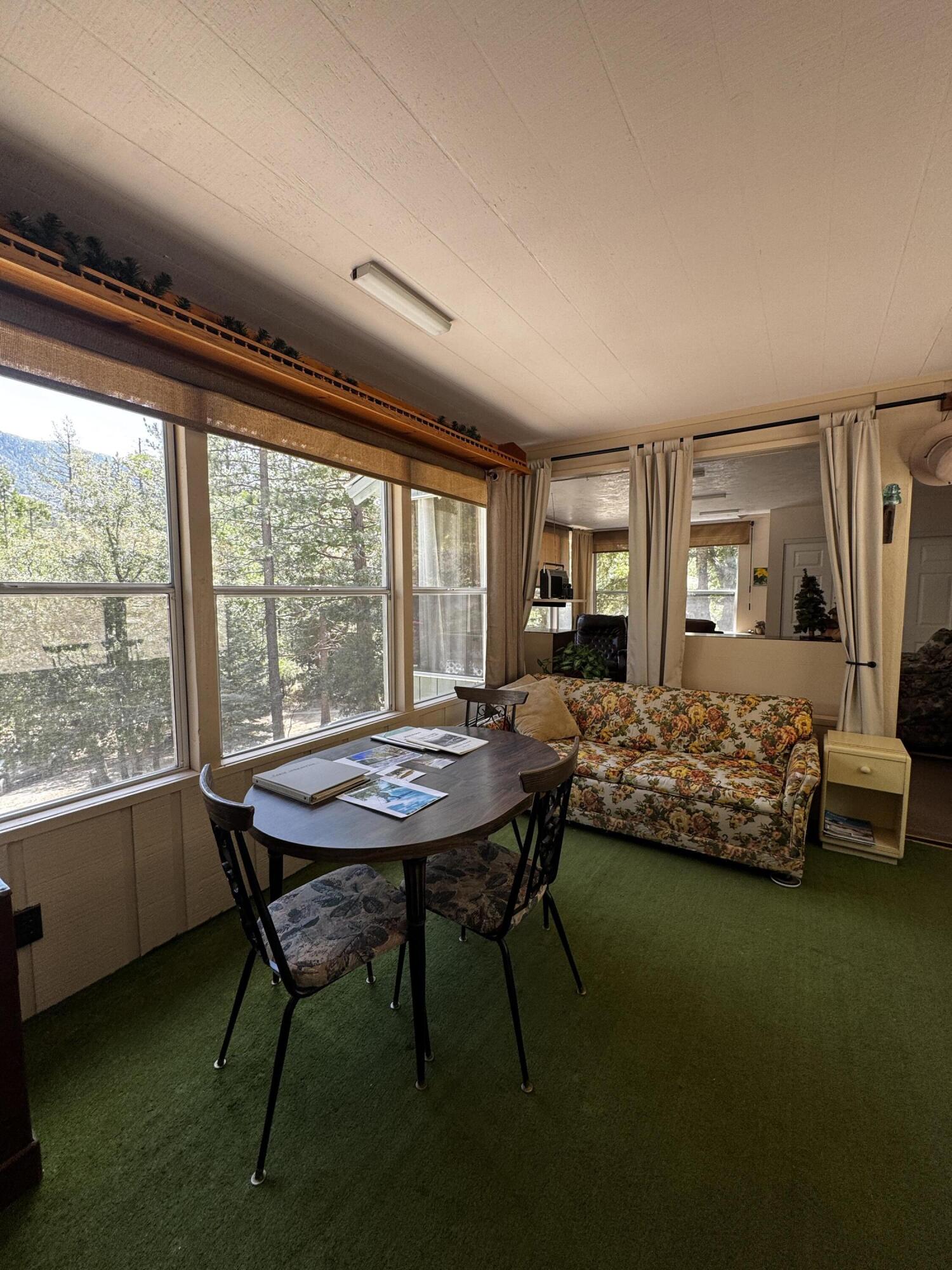 52670 Forest Rte 4S02 Idyllwild, CA 92549 - Photo 20 of 51 a bedroom with a bed chair and a large window