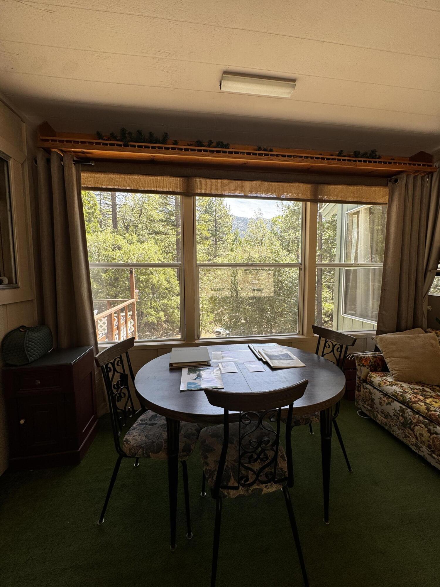 52670 Forest Rte 4S02 Idyllwild, CA 92549 - Photo 21 of 51 a dining room with furniture and window