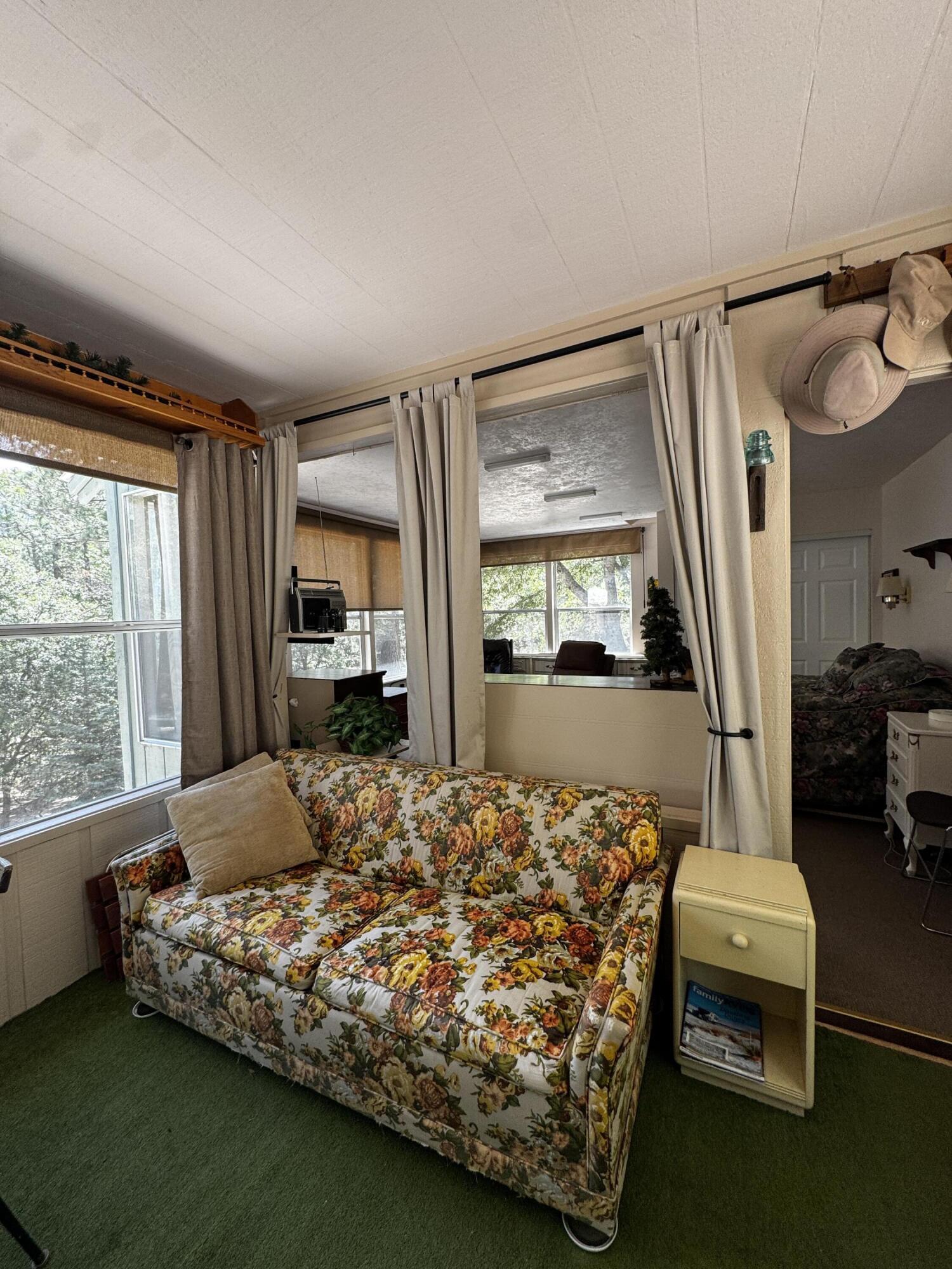 52670 Forest Rte 4S02 Idyllwild, CA 92549 - Photo 22 of 51 a bed sitting in a bedroom next to a window