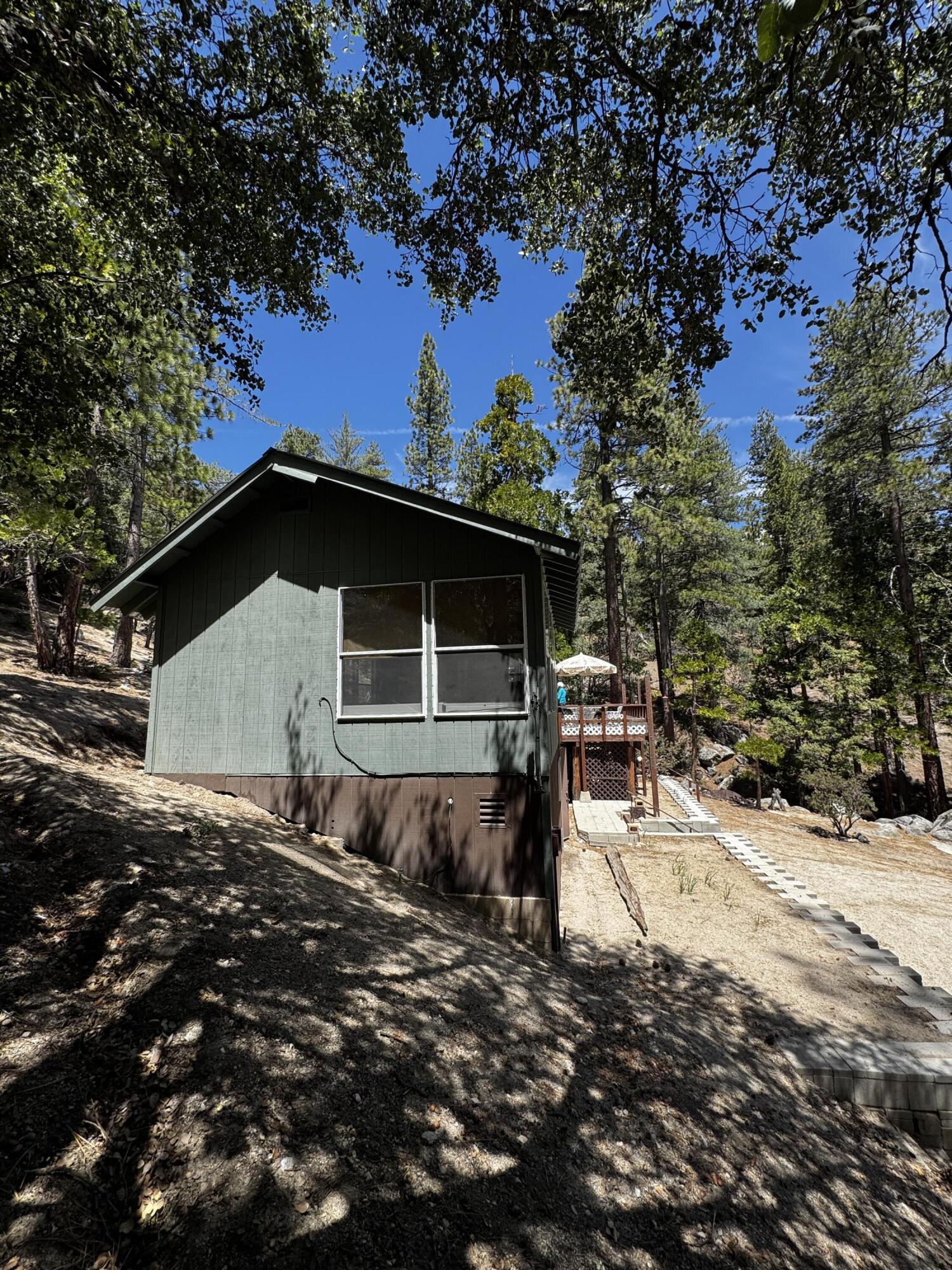 52670 Forest Rte 4S02 Idyllwild, CA 92549 - Photo 24 of 51 a house with trees in the background
