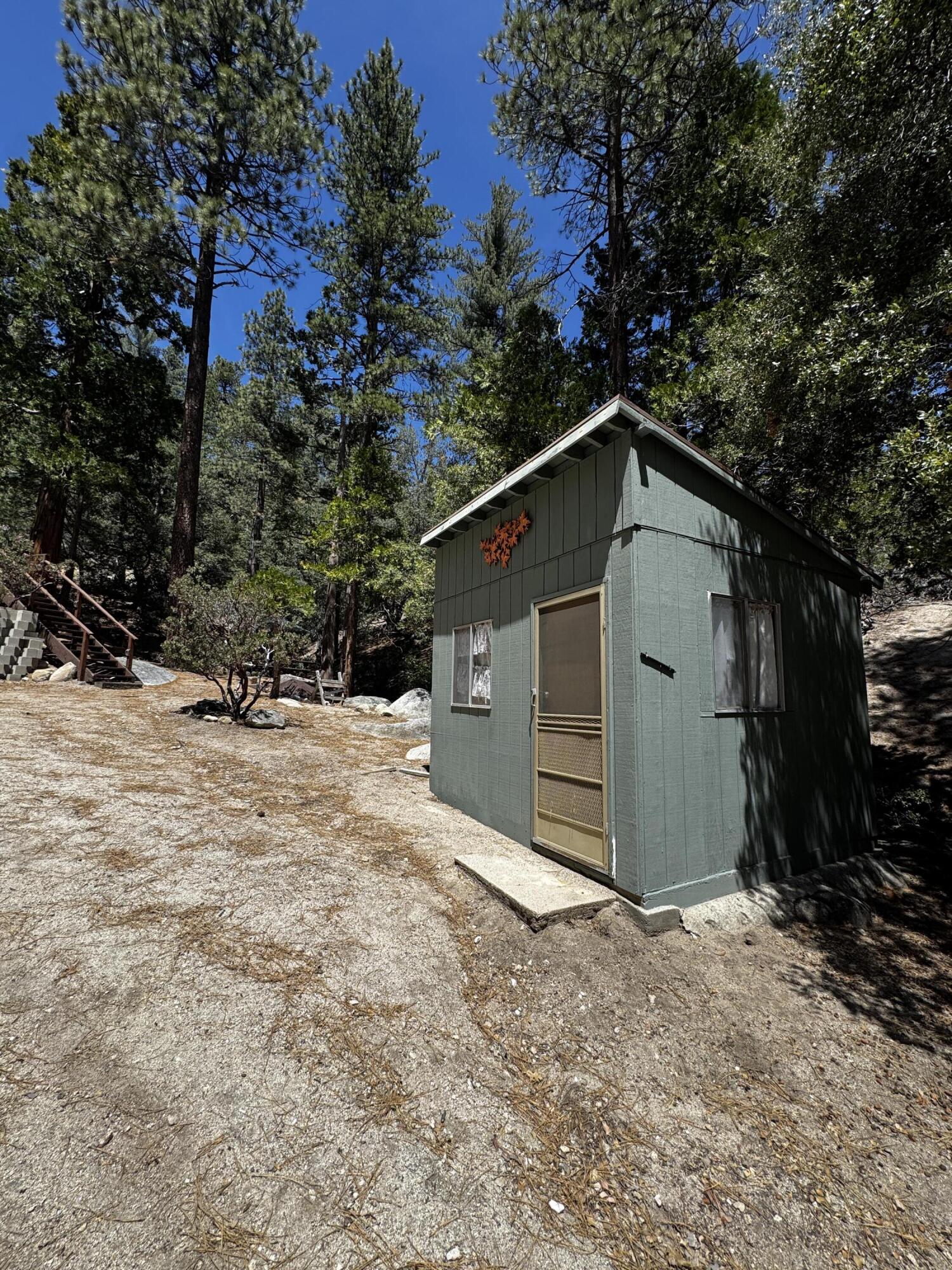 52670 Forest Rte 4S02 Idyllwild, CA 92549 - Photo 32 of 51 a view of a house with a yard