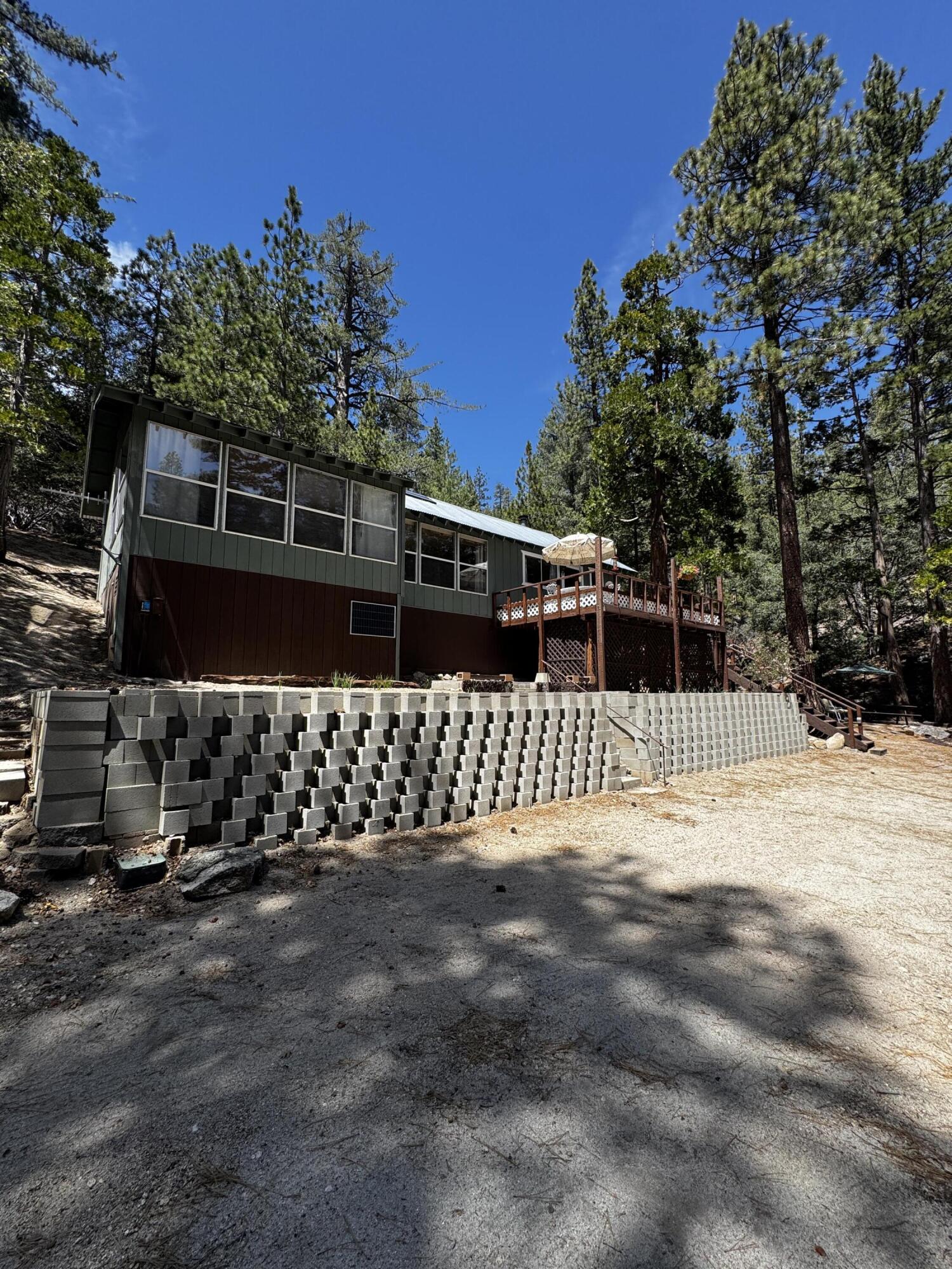 52670 Forest Rte 4S02 Idyllwild, CA 92549 - Photo 4 of 51 a front view of a house with a yard