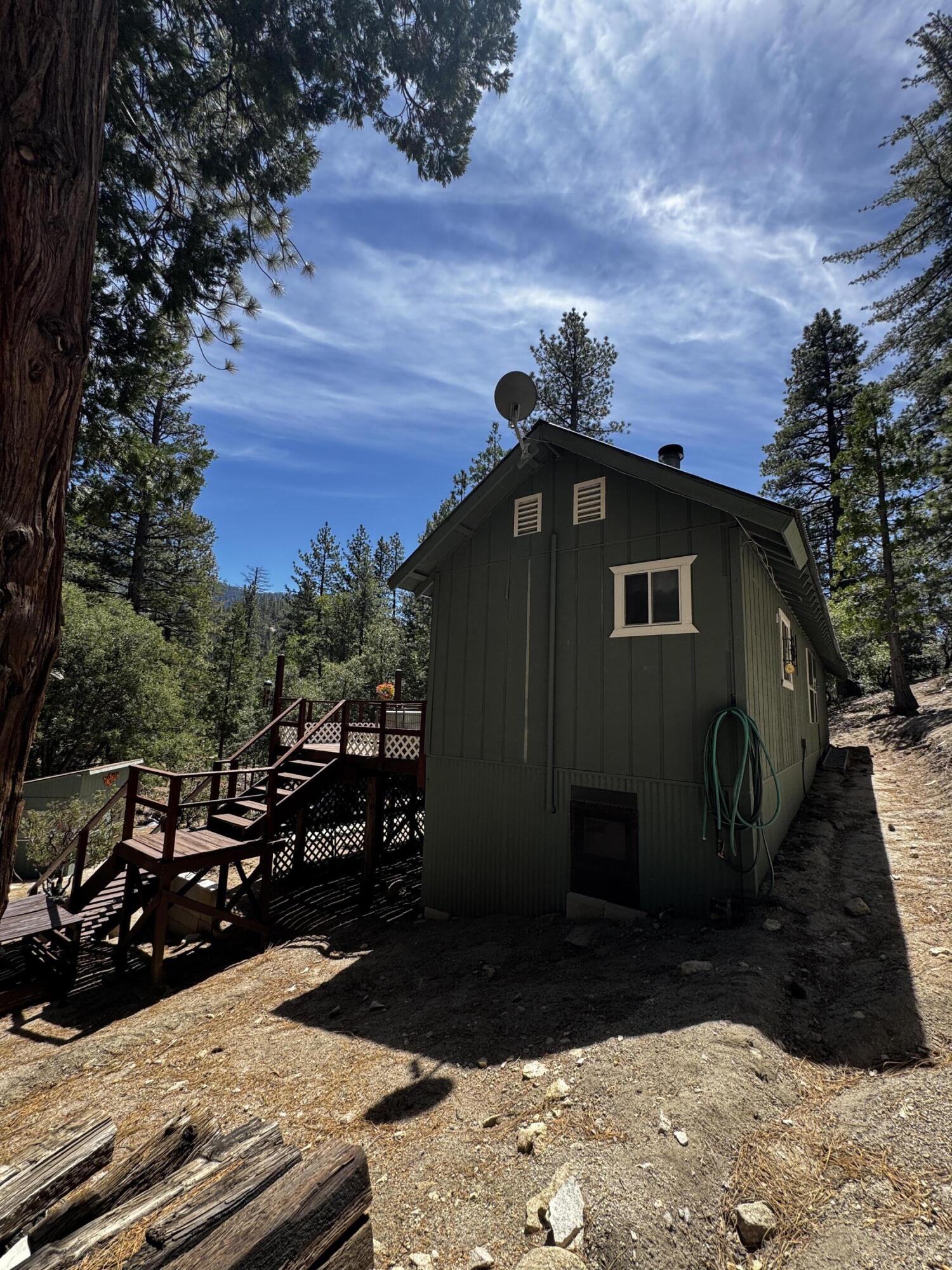 52670 Forest Rte 4S02 Idyllwild, CA 92549 - Photo 5 of 51 a view of multiple house with wooden fence