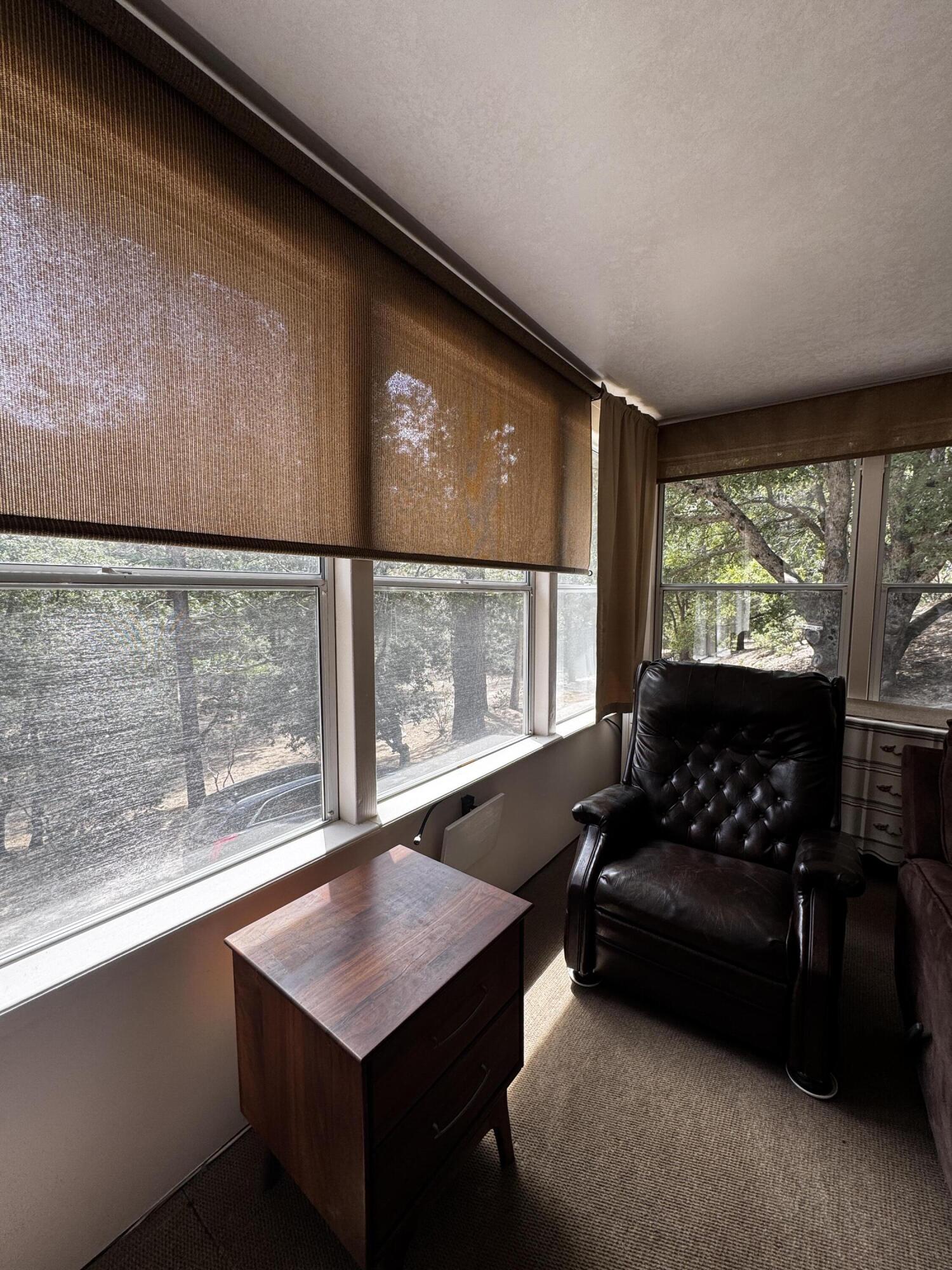 52670 Forest Rte 4S02 Idyllwild, CA 92549 - Photo 10 of 51 a living room with furniture and large windows