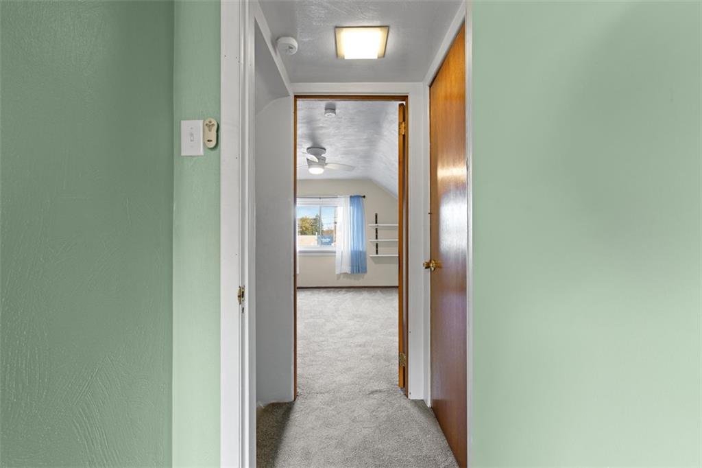 3144 Leechburg Road Lower Burrell, PA 15068 - Photo 32 of 47 a view of a bathroom from a corridor