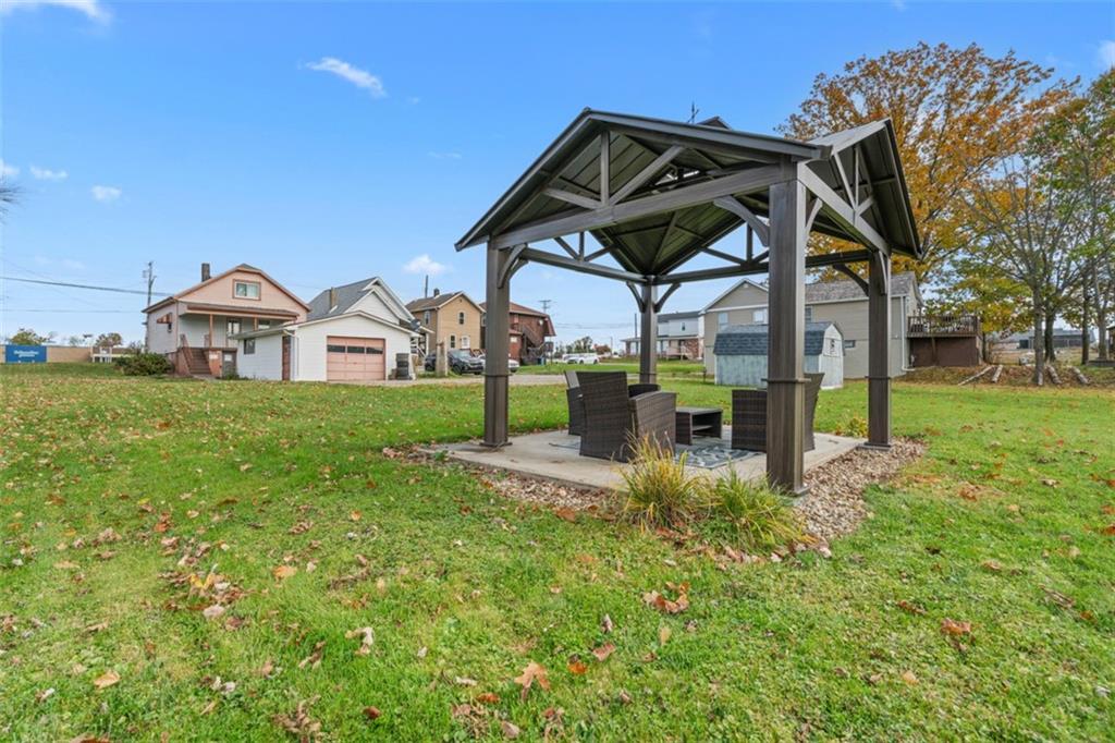 3144 Leechburg Road Lower Burrell, PA 15068 - Photo 44 of 47 a view of a chair and table in the garden