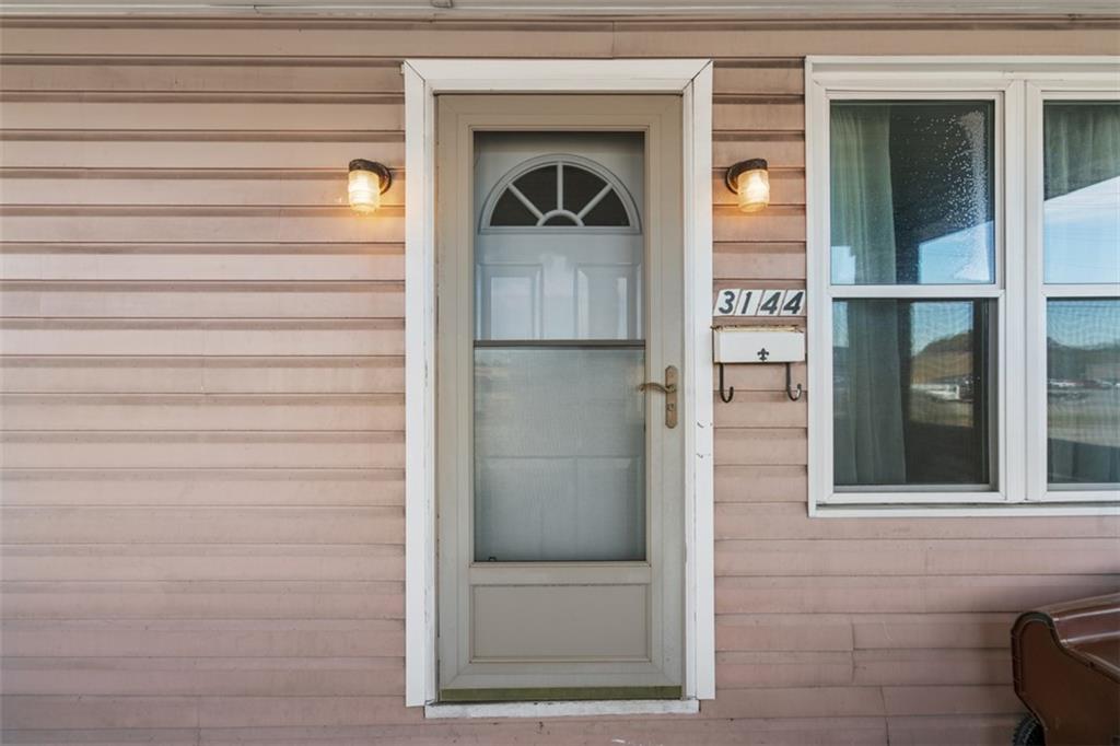 3144 Leechburg Road Lower Burrell, PA 15068 - Photo 7 of 47 a view of front door and bedroom