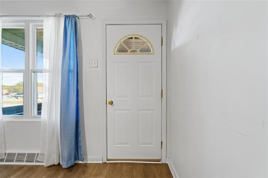 3144 Leechburg Road Lower Burrell, PA 15068 - Photo 8 of 47 a view of empty room with wooden floor and window