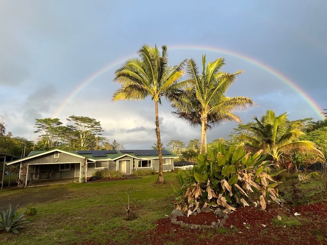 15-1509 22nd Avenue Keaau, HI 96749 - Photo 1 of 25 a view of a big yard with swimming pool