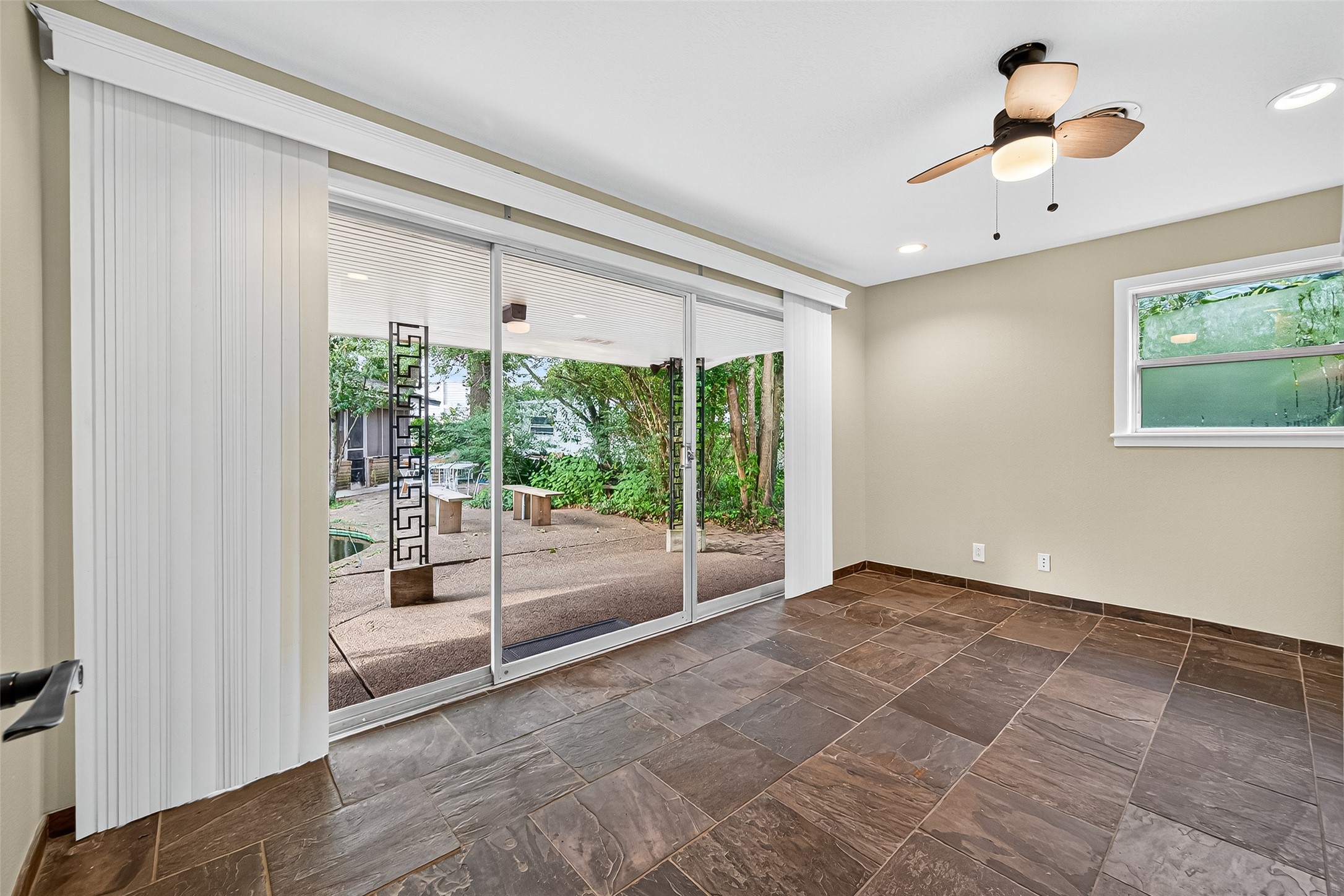 4628 Roseneath Drive, Unit A Houston, TX 77021 - Photo 6 of 15 Bedroom 2 with views of the backyard and koi pond