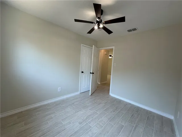 a bathroom with a sink a toilet and bathtub