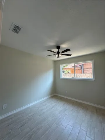a bathroom with a double vanity sink toilet and shower