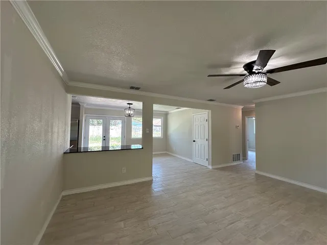 a view of livingroom with hardwood and hallway