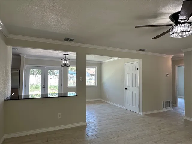 a view of a hallway with closet