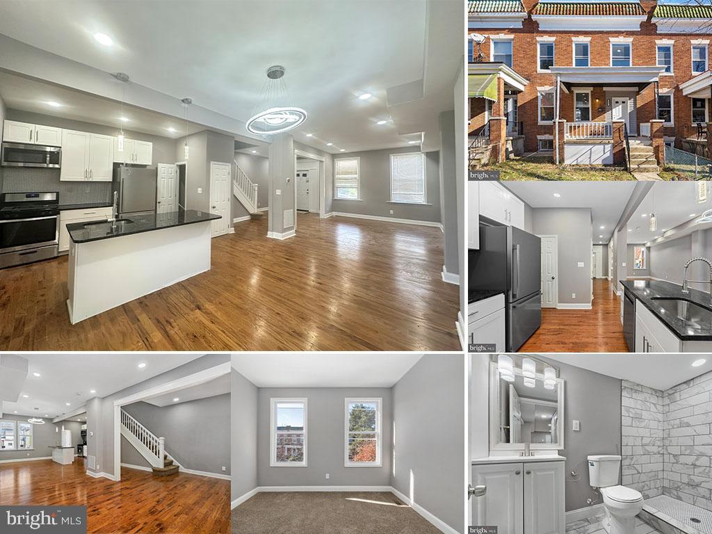 a view of residential houses with yard