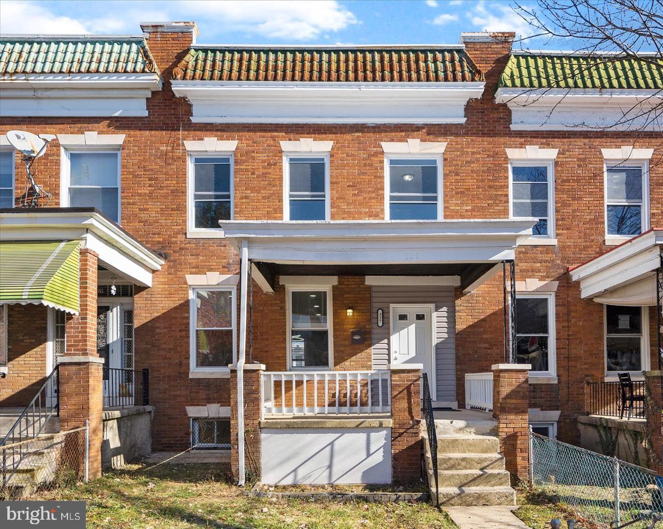 327 Lyndhurst Street Baltimore, MD 21229 - Photo 38 of 44 a view of a house with a patio