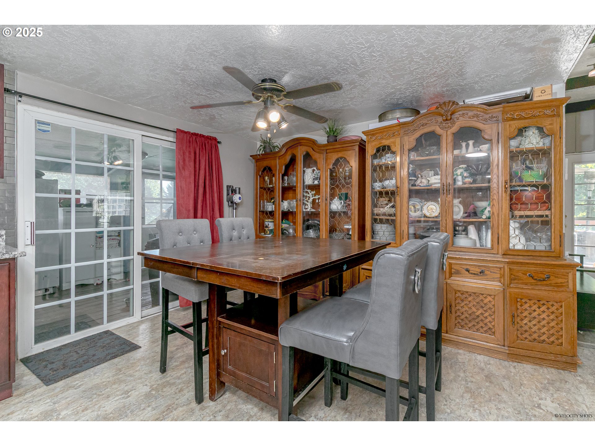 38289 Southeast Coupland Road Estacada, OR 97023 - Photo 13 of 48 a dining room with furniture a rug and a chandelier