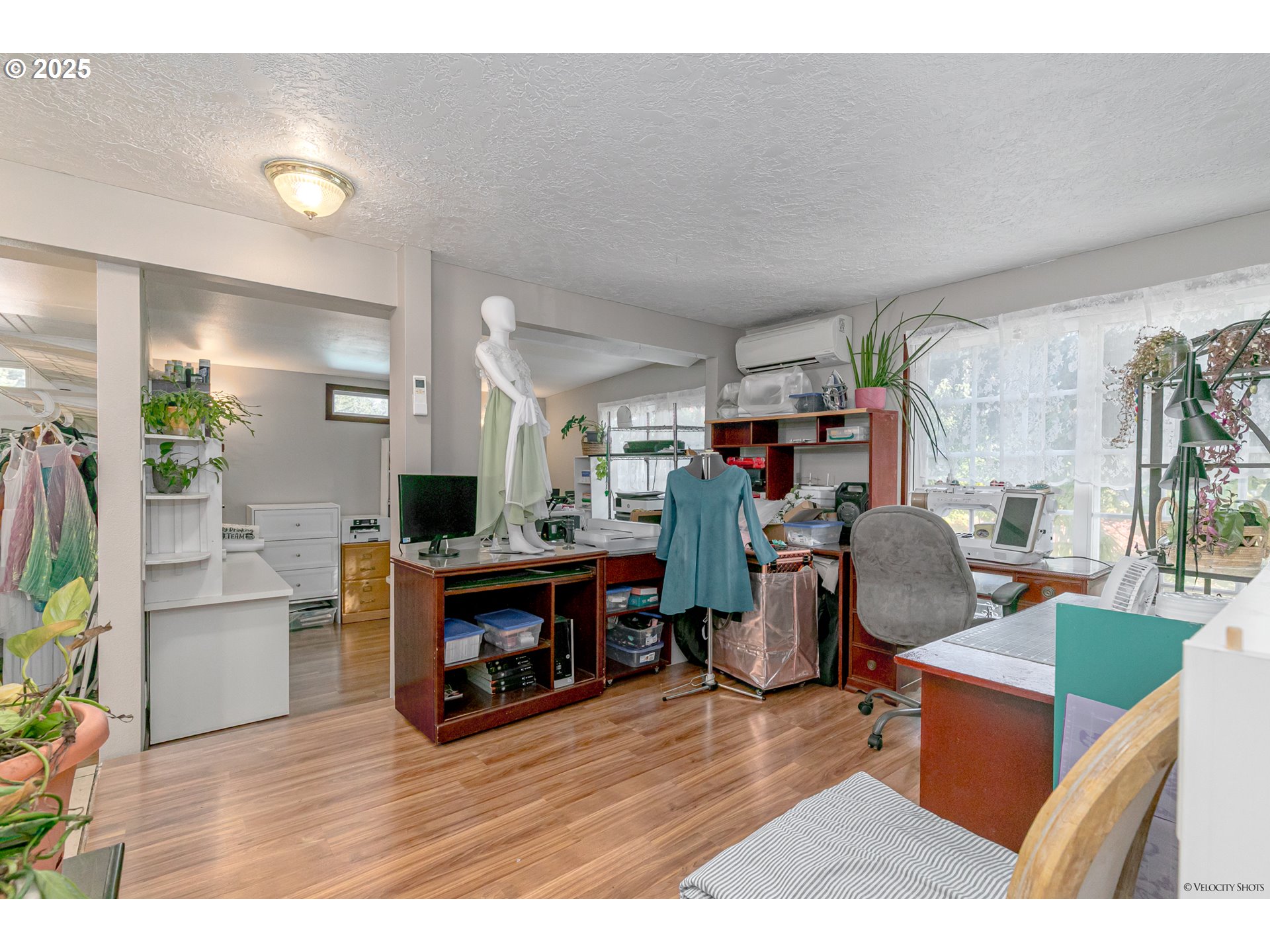 38289 Southeast Coupland Road Estacada, OR 97023 - Photo 14 of 48 a living room with furniture and a flat screen tv