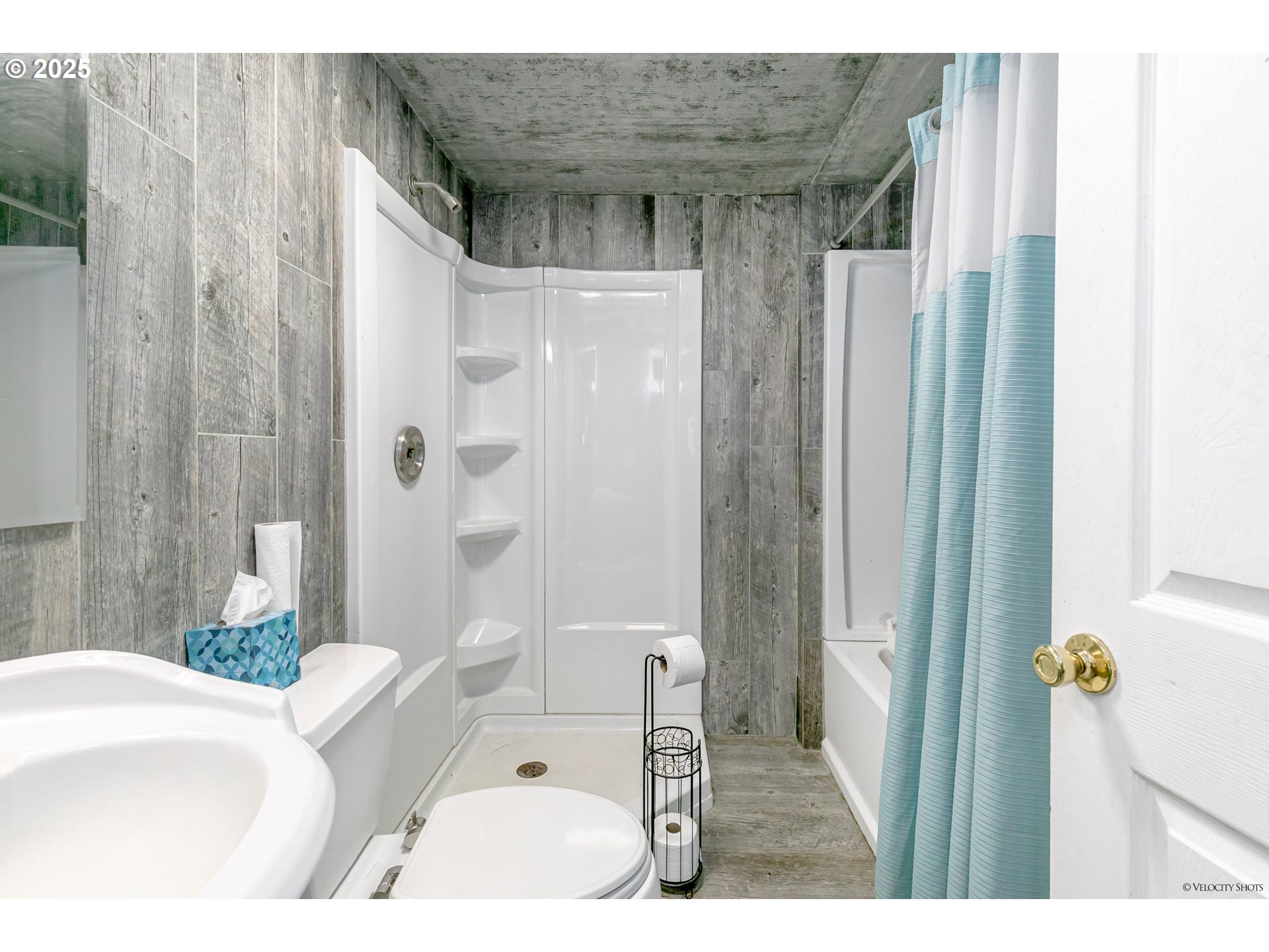 38289 Southeast Coupland Road Estacada, OR 97023 - Photo 22 of 48 a bathroom with a tub shower and sink
