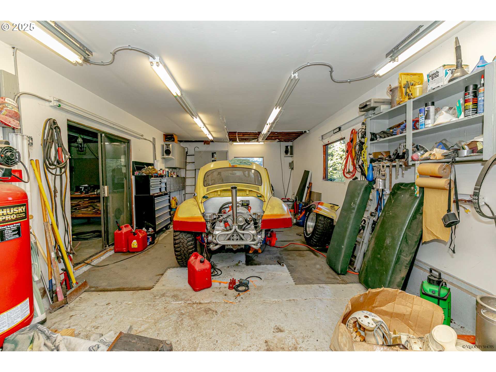 38289 Southeast Coupland Road Estacada, OR 97023 - Photo 37 of 48 a bedroom with lots of stuff and toys