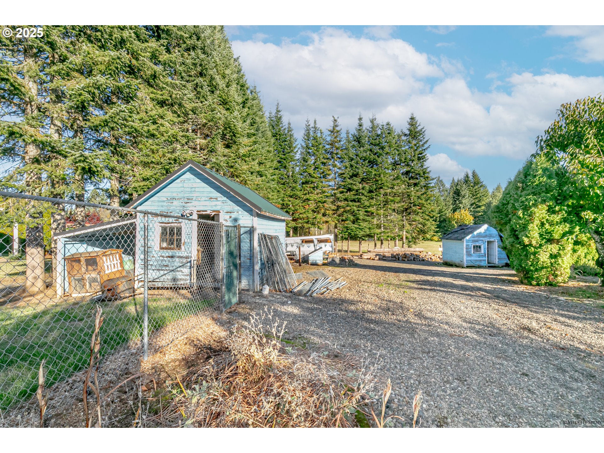 38289 Southeast Coupland Road Estacada, OR 97023 - Photo 47 of 48 a front view of a house with a yard and trees