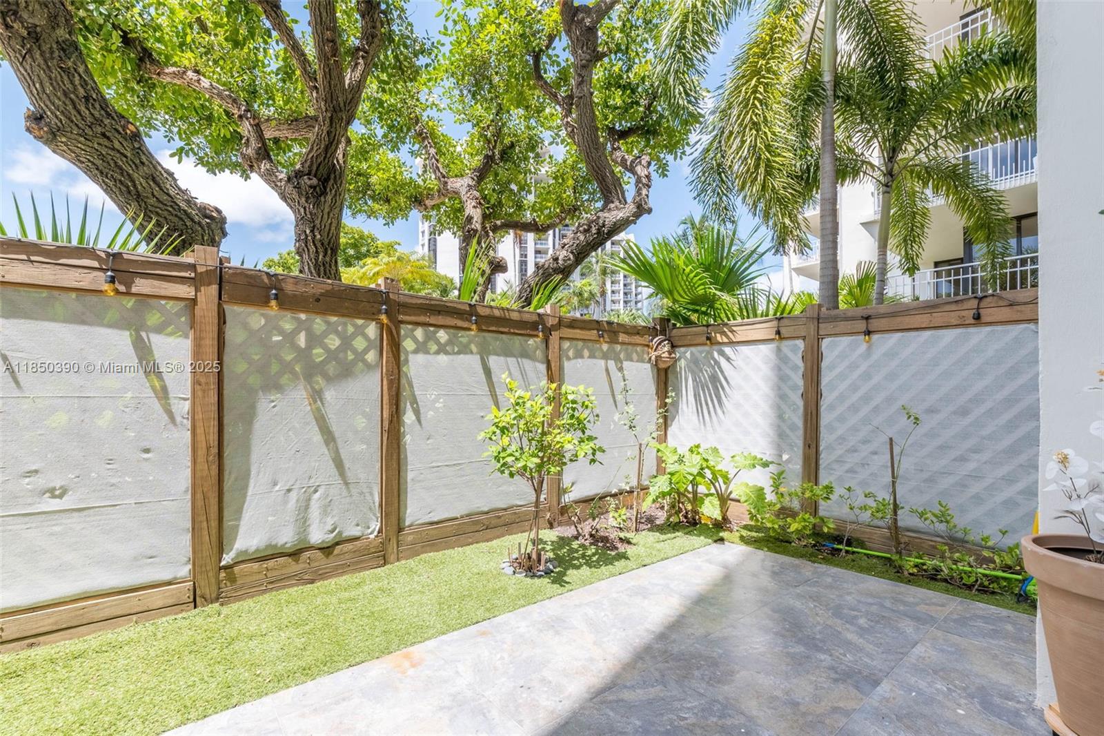 a view of a backyard with a garden