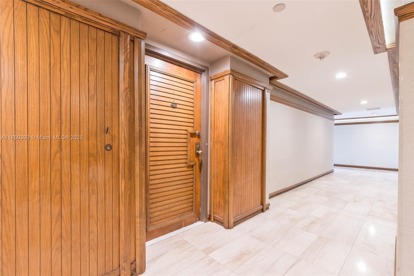 1000 Quayside Terrace, Unit 308 Miami, FL 33138 - Photo 27 of 28 a view of a hallway