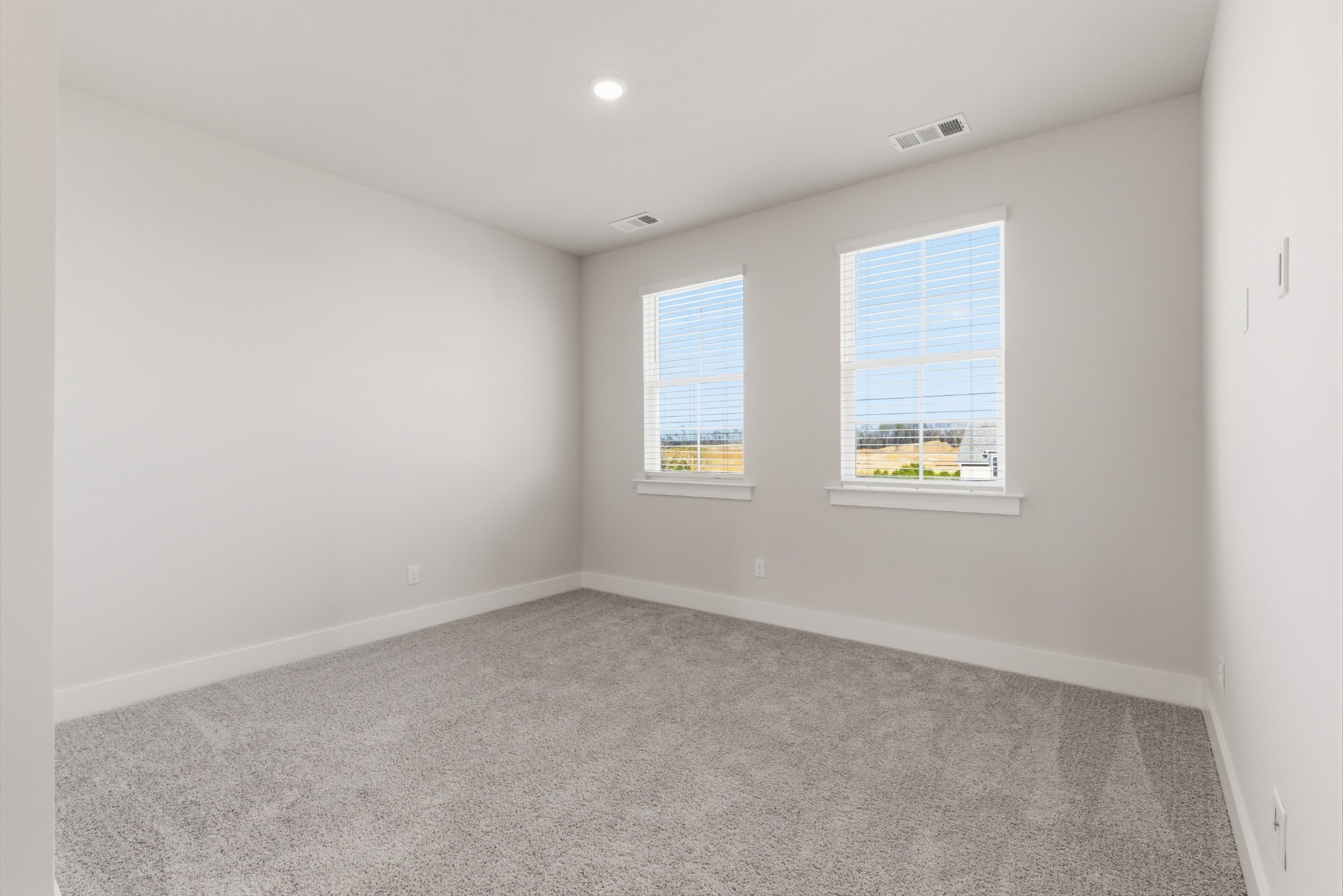 1809 Flatwaters Street Spring Hill, TN 37174 - Photo 22 of 27 an empty room with windows