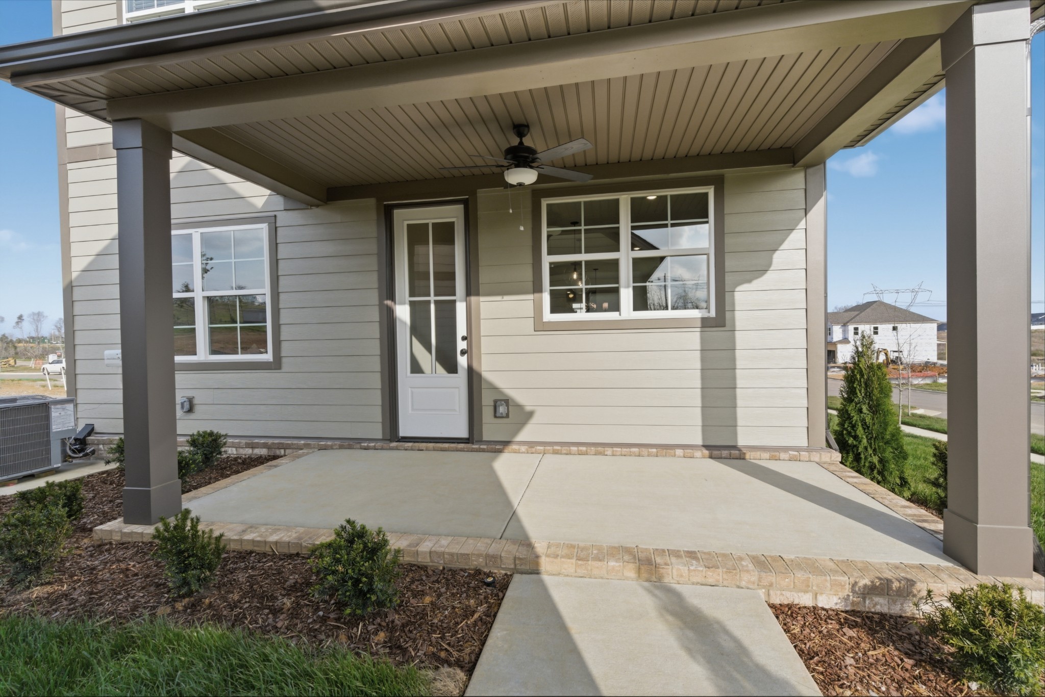1809 Flatwaters Street Spring Hill, TN 37174 - Photo 27 of 27 a front view of a house with garden