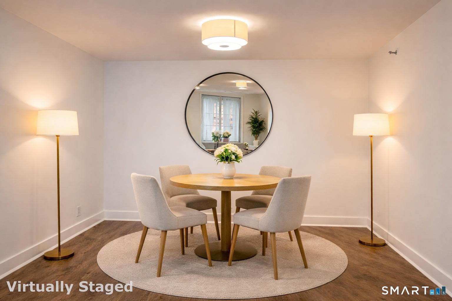 25 Forest Street, Unit 7K Stamford, CT 06901 - Photo 3 of 15 a view of a dining room with furniture