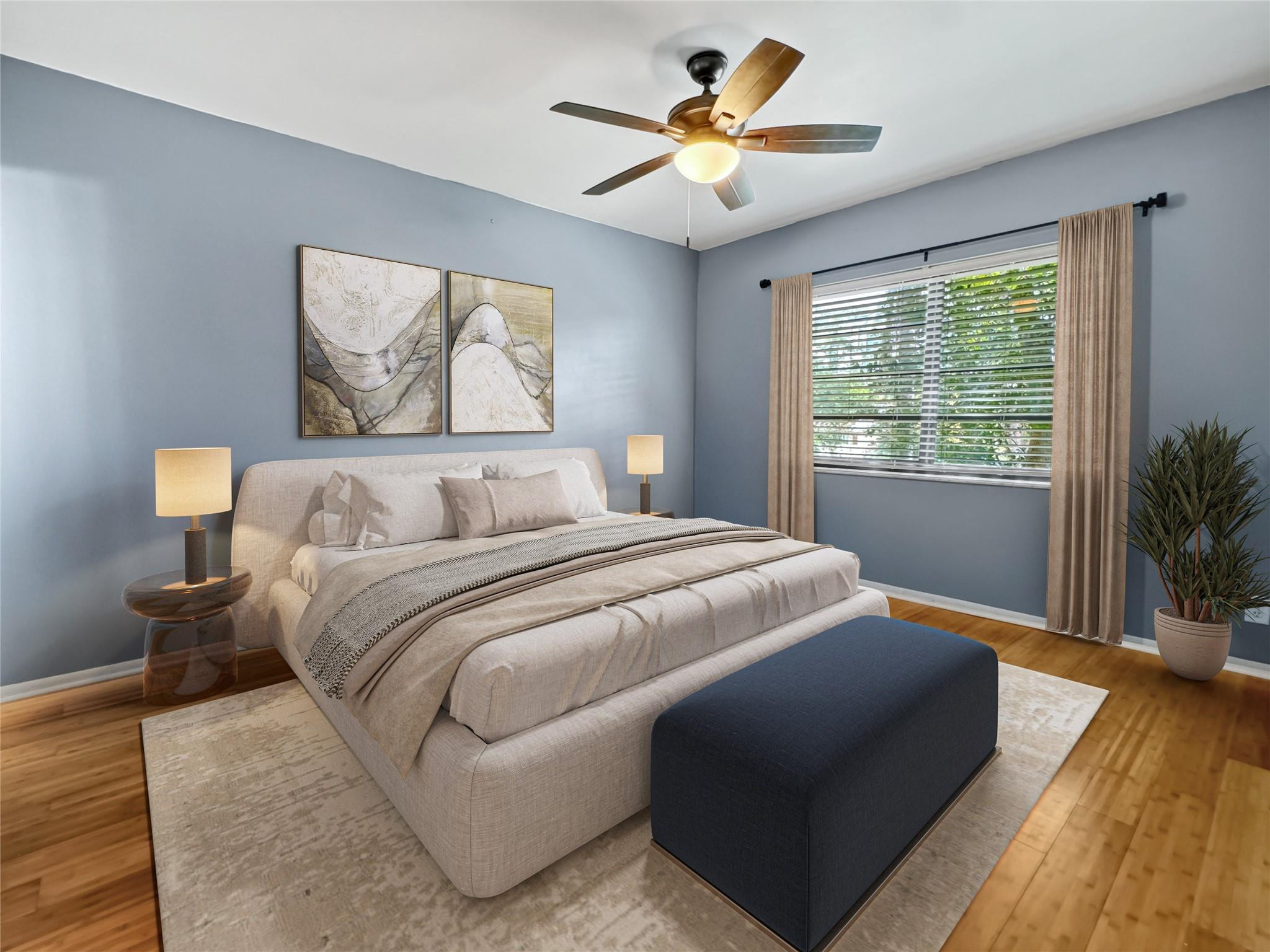 128 South Cypress Road, Unit 823 Pompano Beach, FL 33060 - Photo 11 of 23 a bedroom with a large bed and a window