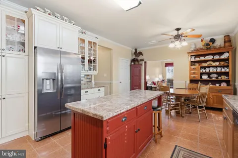 a view of a backyard with sitting area