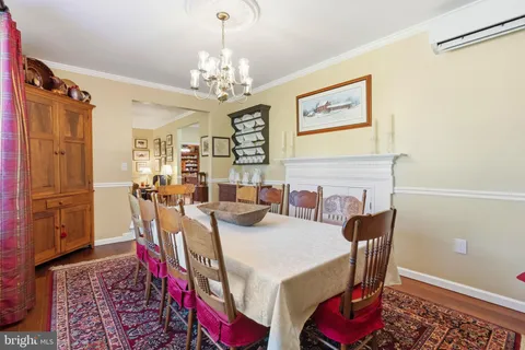 a view of a house with a tree