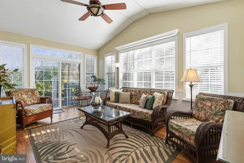 a view of a backyard with sitting area