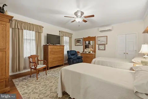 a view of a potted flower in a yard with potted plants