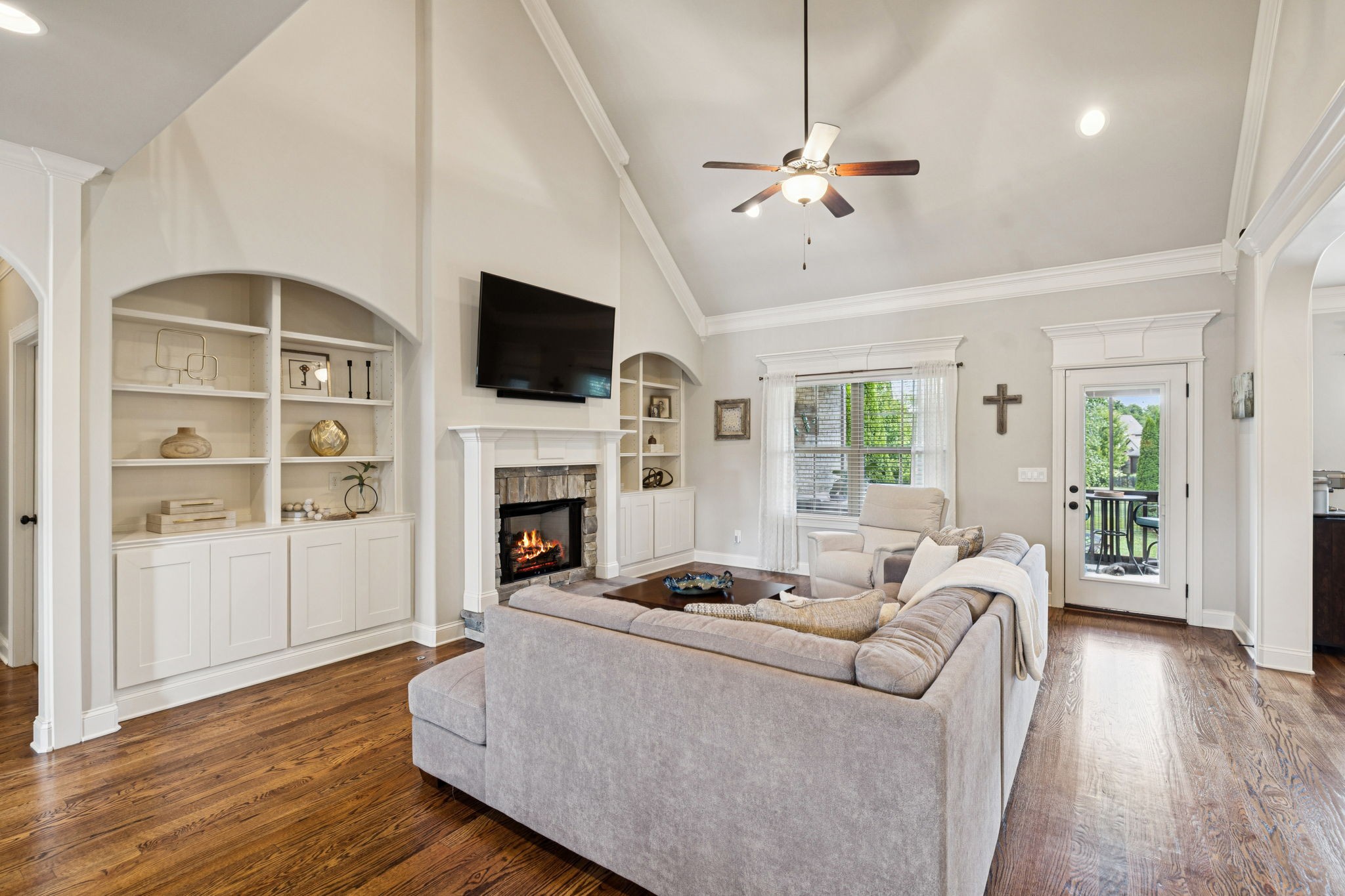 8009 June Apple Lane Spring Hill, TN 37174 - Photo 15 of 69 a living room with furniture a fireplace and a flat screen tv