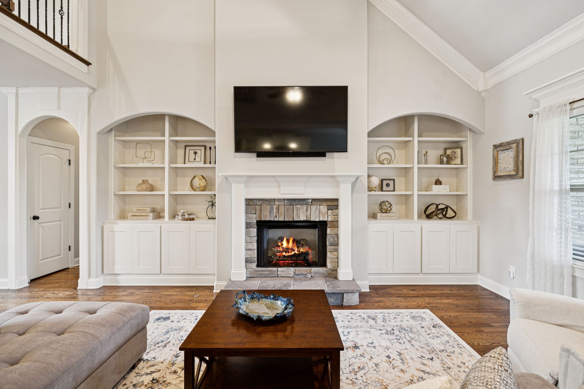 8009 June Apple Lane Spring Hill, TN 37174 - Photo 16 of 69 a living room with furniture fireplace and flat screen tv
