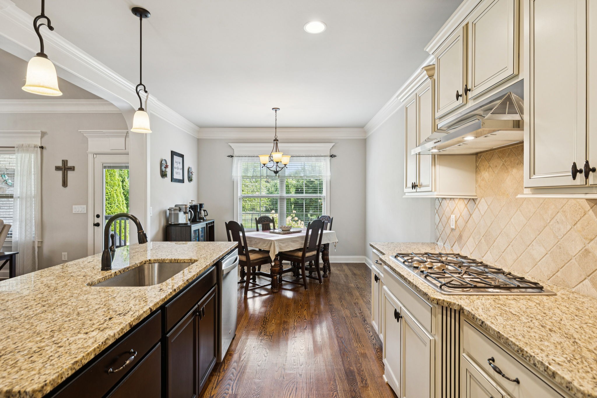 8009 June Apple Lane Spring Hill, TN 37174 - Photo 27 of 69 a kitchen with stainless steel appliances granite countertop a sink stove and refrigerator