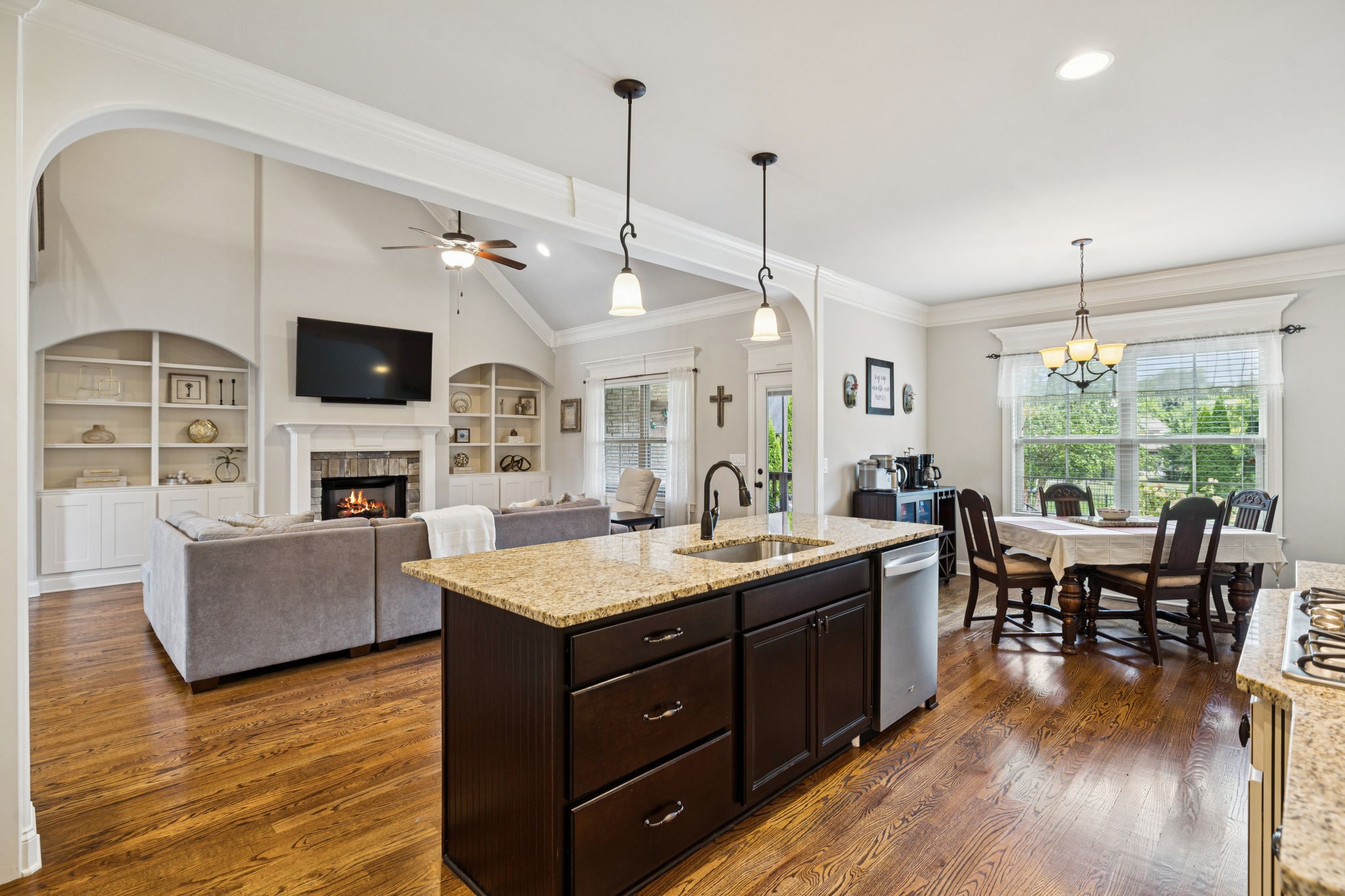 8009 June Apple Lane Spring Hill, TN 37174 - Photo 28 of 69 a large living room with fireplace furniture and a flat screen tv