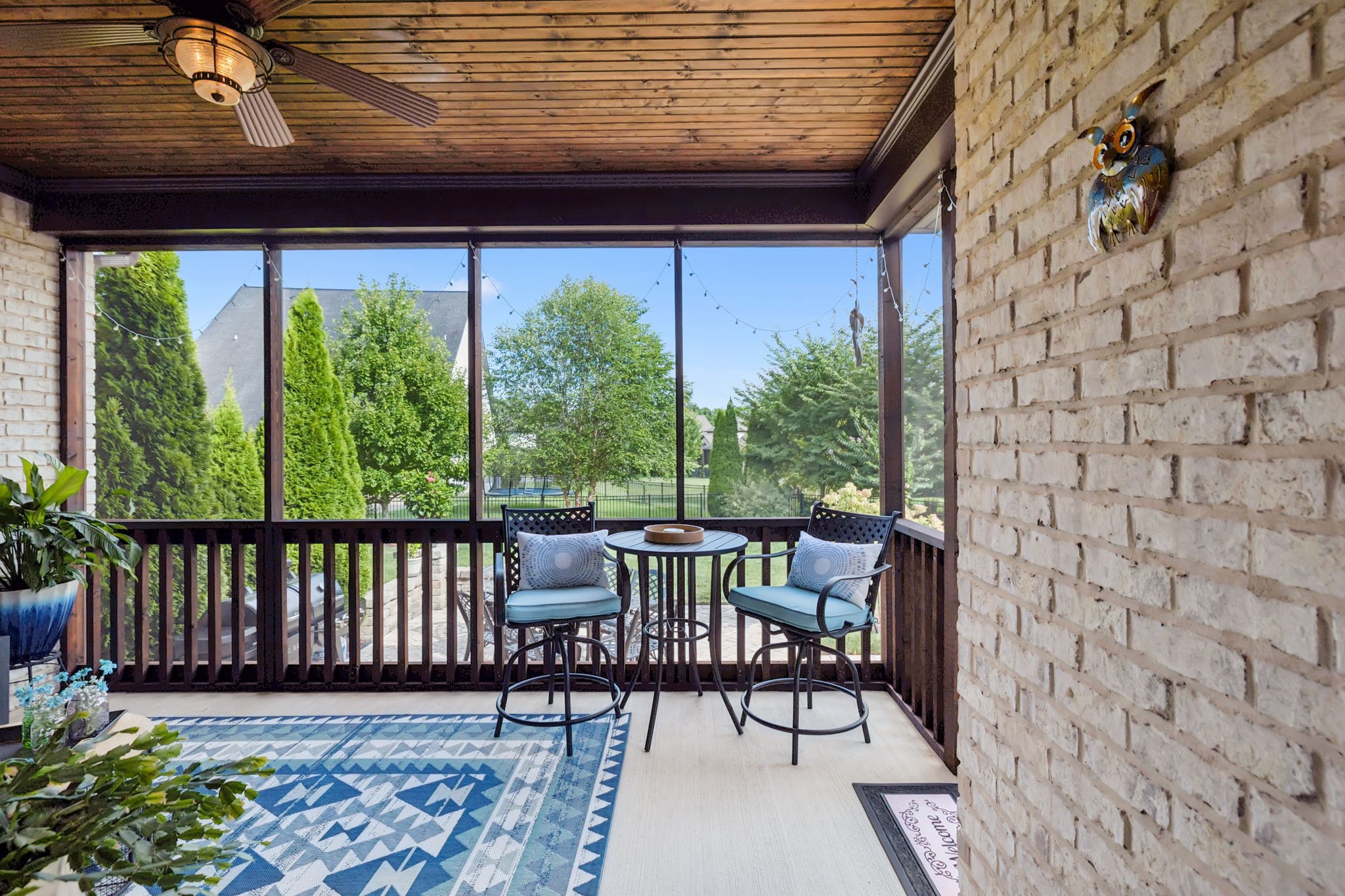 8009 June Apple Lane Spring Hill, TN 37174 - Photo 56 of 69 a view of a patio with table and chairs with wooden floor and fence