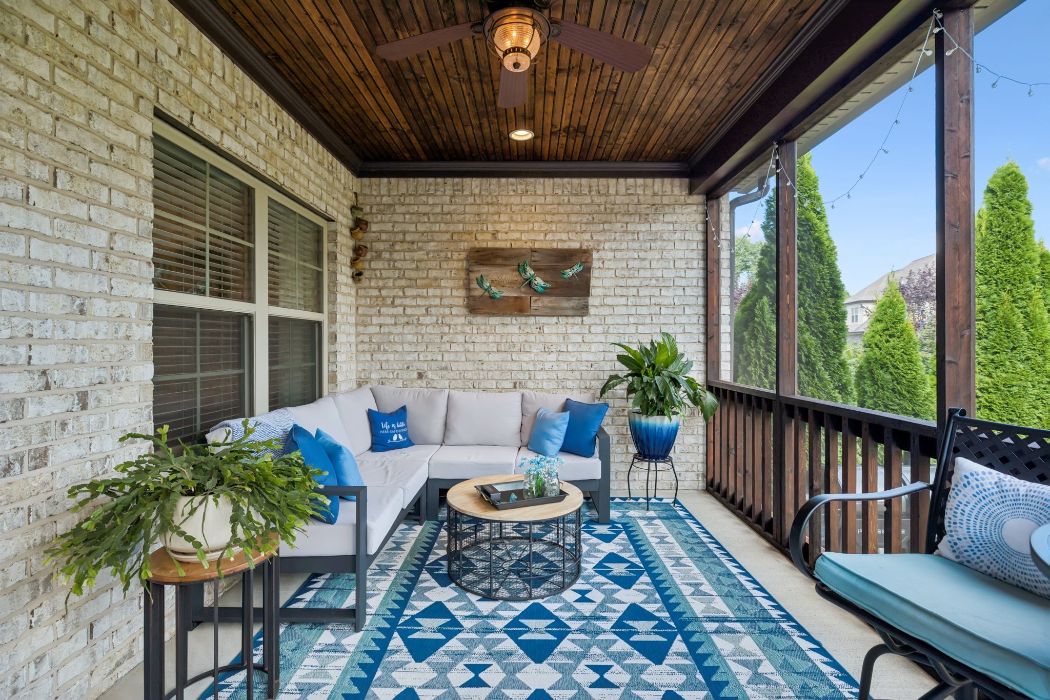 8009 June Apple Lane Spring Hill, TN 37174 - Photo 57 of 69 a outdoor living space with furniture and a potted plant