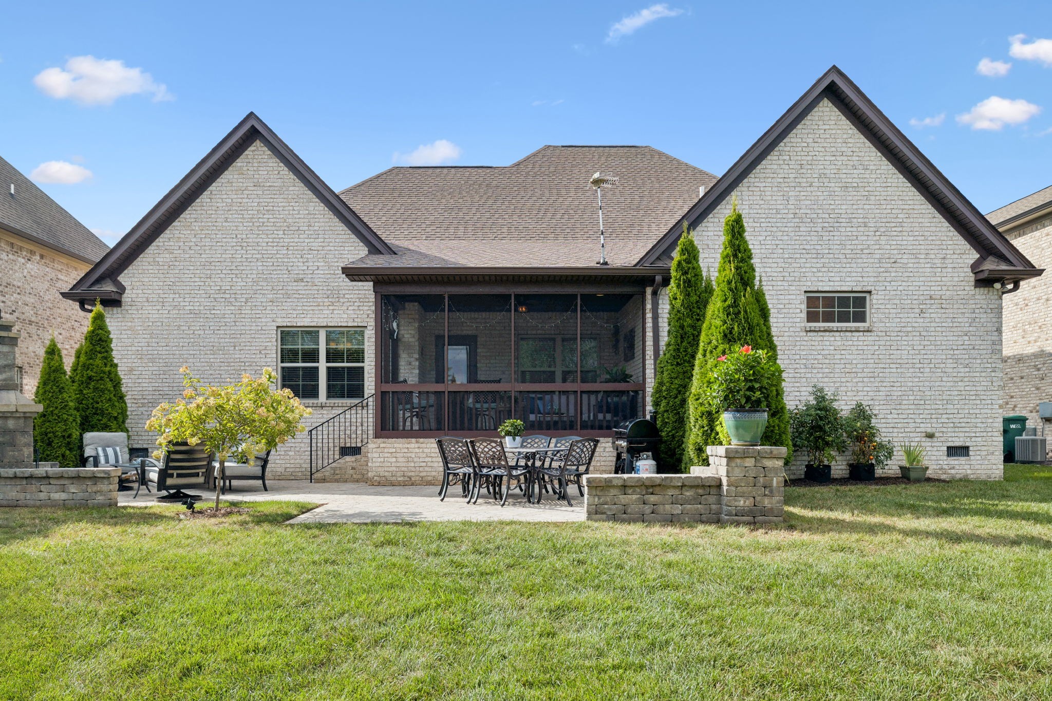 8009 June Apple Lane Spring Hill, TN 37174 - Photo 65 of 69 a front view of house with a garden and patio