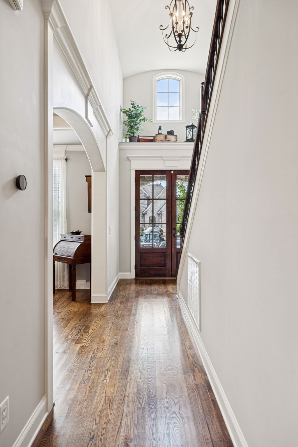 8009 June Apple Lane Spring Hill, TN 37174 - Photo 7 of 69 a view of a hallway view with wooden floor and staircase