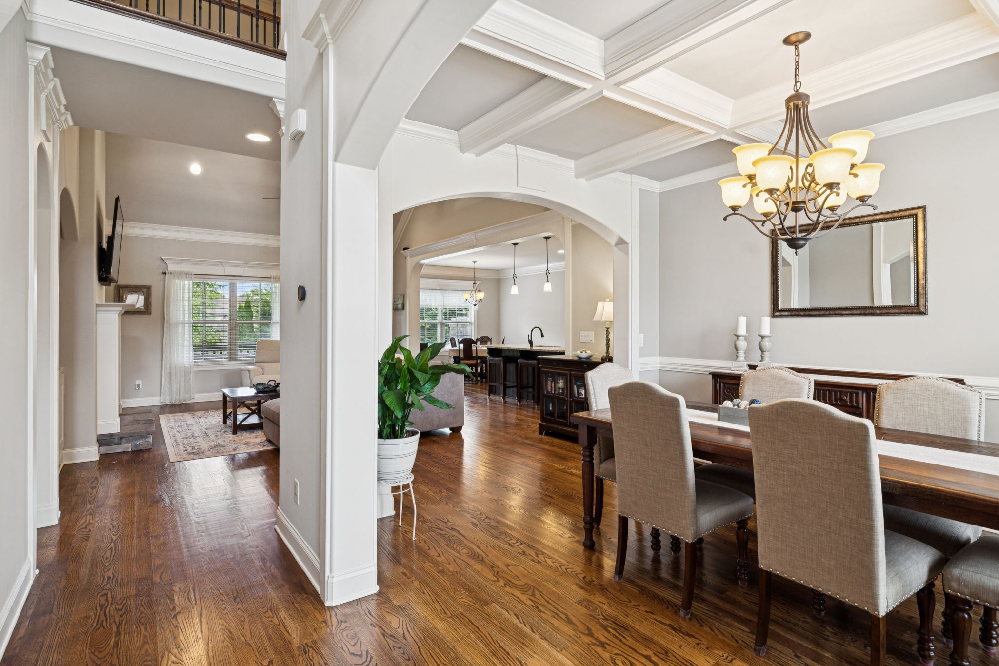 8009 June Apple Lane Spring Hill, TN 37174 - Photo 8 of 69 a view of a dining room with furniture wooden floor and chandelier