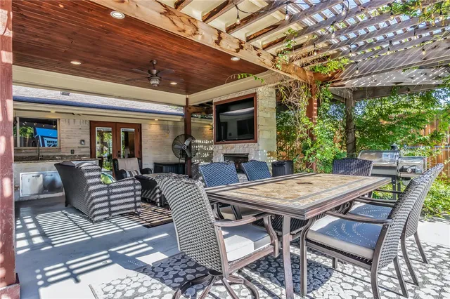 a view of a patio with furniture