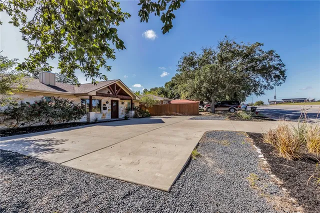 a view of house with outdoor space