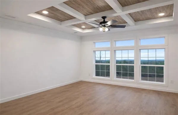 a kitchen with stainless steel appliances granite countertop a sink and a microwave