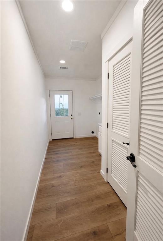 1590 Buttermilk Road Southwest Cave Spring, GA 30124 - Photo 23 of 43 a view of a hallway with wooden floor and staircase