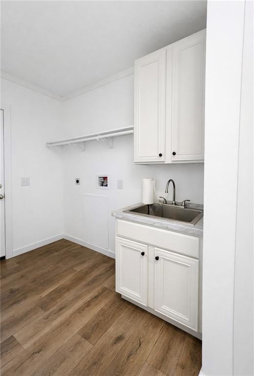 1590 Buttermilk Road Southwest Cave Spring, GA 30124 - Photo 24 of 43 a kitchen with granite countertop white cabinets and a sink