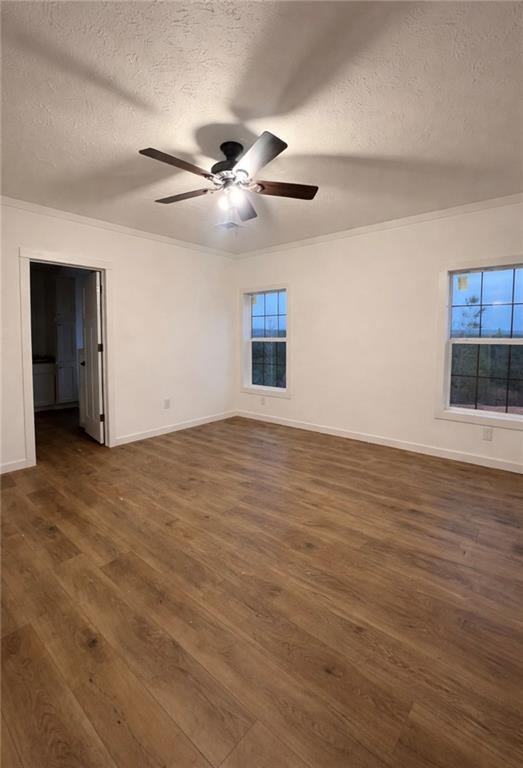 1590 Buttermilk Road Southwest Cave Spring, GA 30124 - Photo 29 of 43 a view of an empty room with window and wooden floor